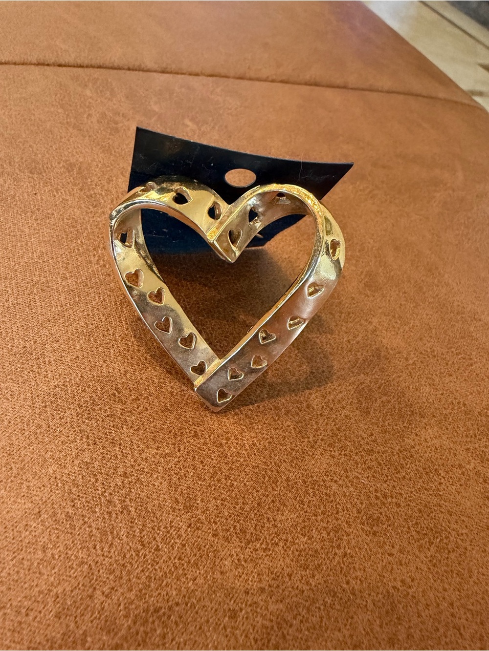Gold Heart-Shaped Bracelet with Cutout Hearts